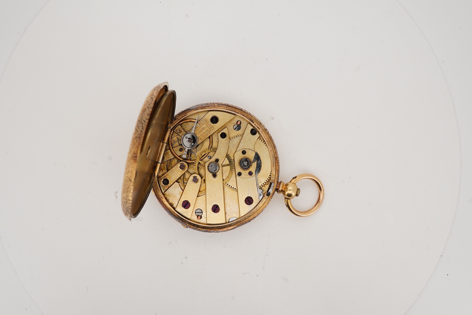 A lady's early 20th century Swiss 18k open faced key wind fob watch